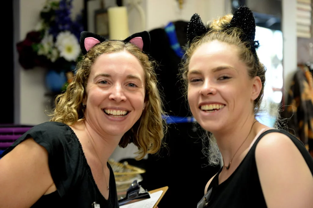 Interfaith's fall intern Elena (right) and I, exhausted after distribution day. Happy Halloween! Photo by Hurley Event Photography.