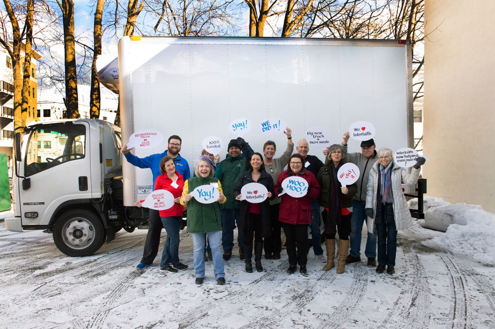 Interfaith Staff Photo in front of truck