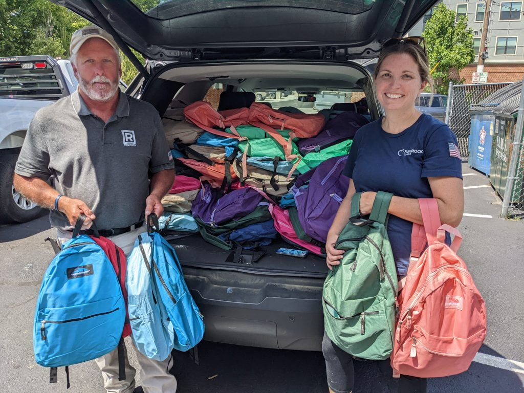 Employees from FoxRock Properties dropped off hundreds of donated backpacks for Interfaith's annual Backpack Drive.