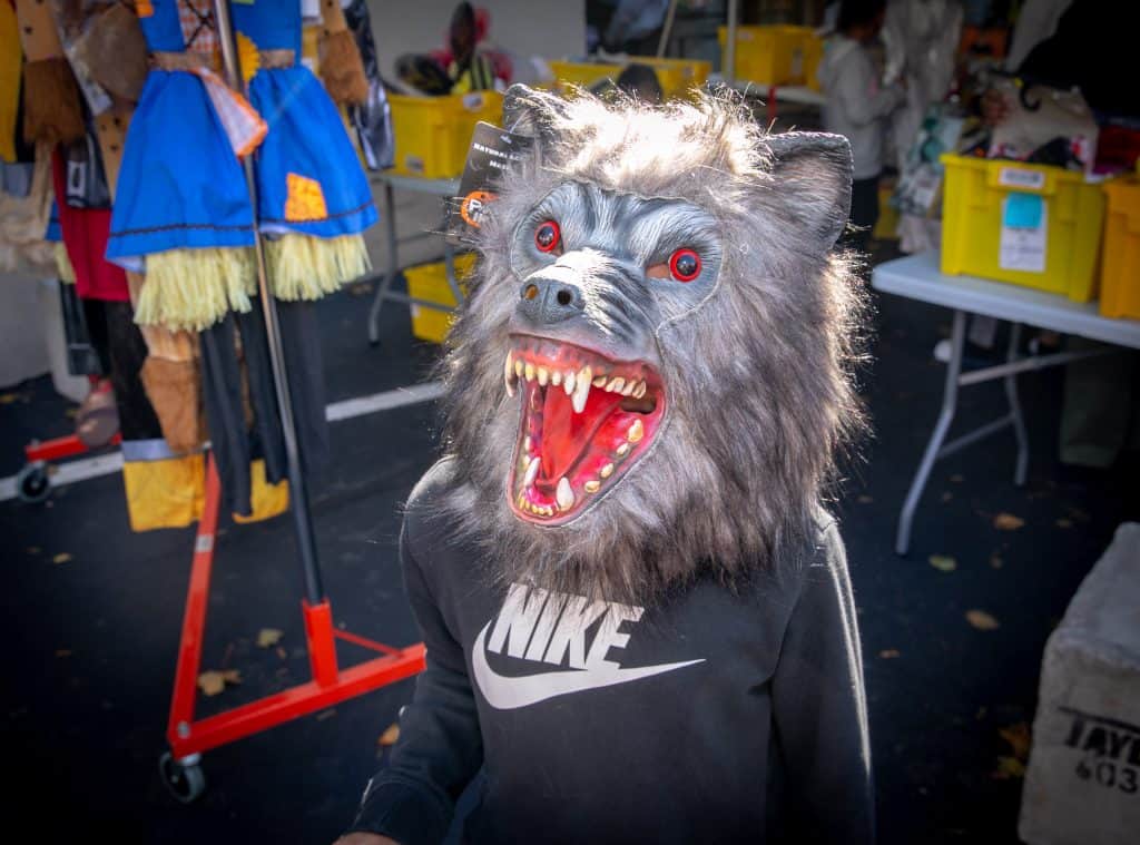 child in werewolf mask