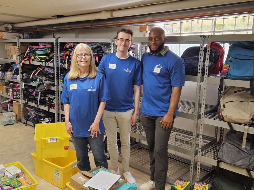 Volunteers from Arbella Insurance helped prepare backpacks for distribution.