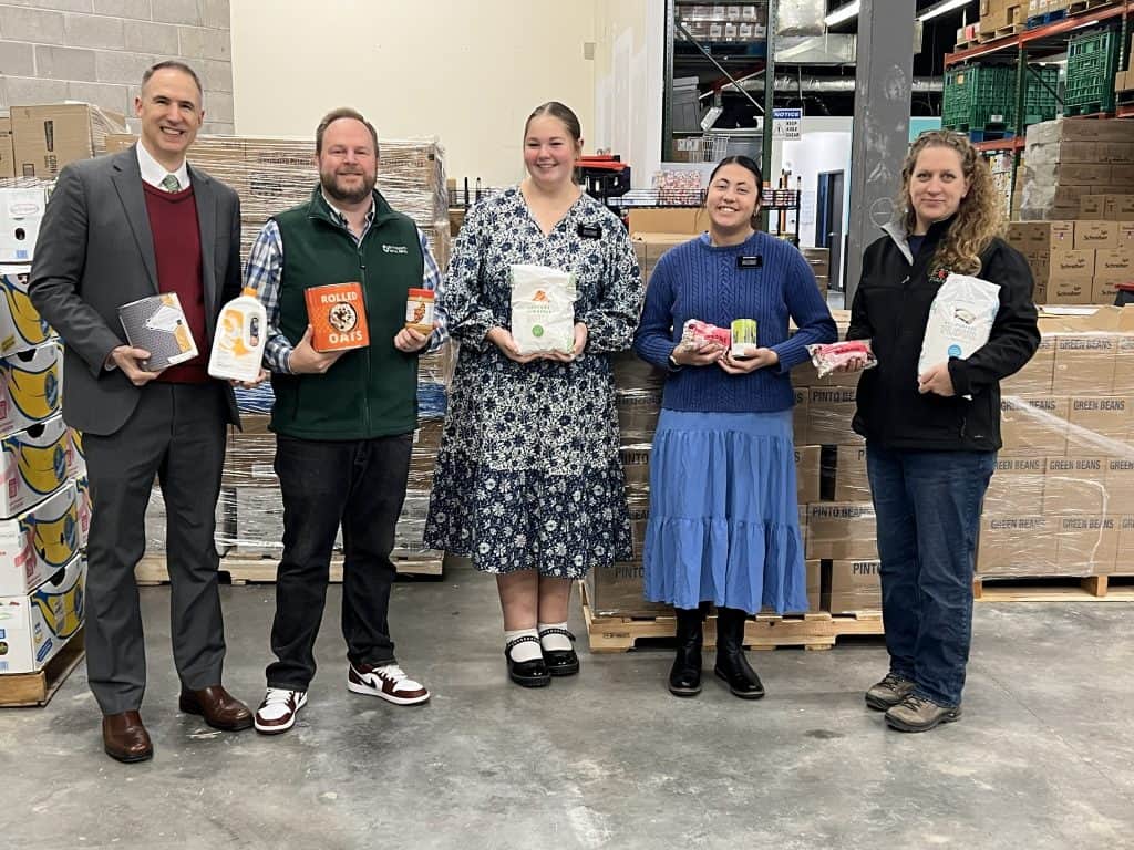 Photo Caption (from left to right): Jeremy Medford - President of the Hingham Massachusetts Stake of The Church of Jesus Christ of Latter-Day Saints, Rick Doane – Executive Director of Interfaith Social Services, Sister Balls and Sister McKell Missionaries for The Church of Jesus Christ of Latter-Day Saints and Pam Deholm - Executive Director of The South Shore Food Bank.