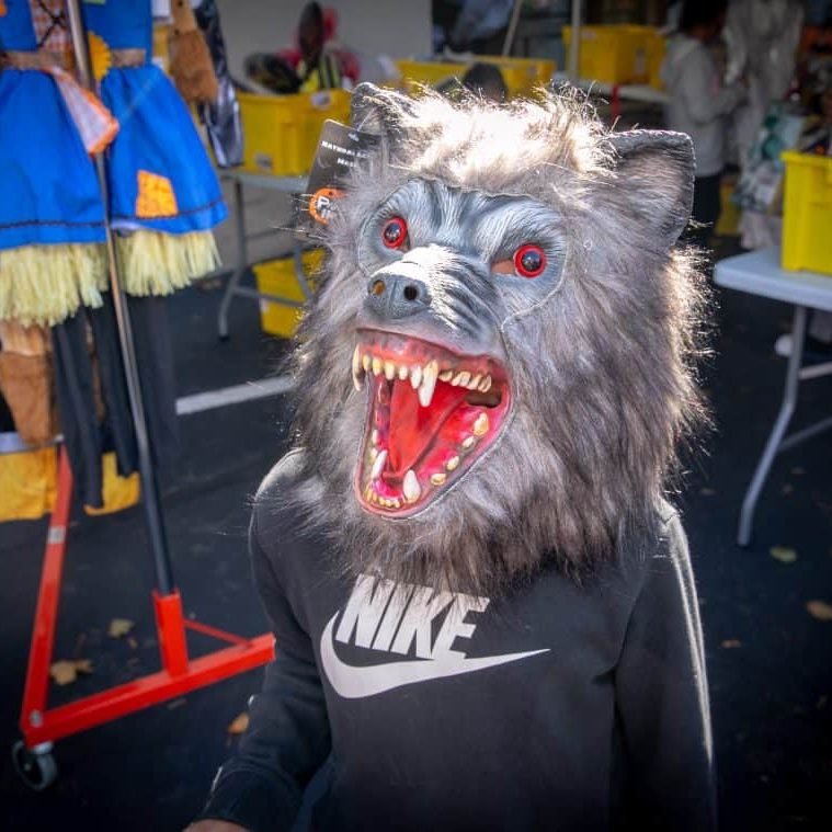 child in werewolf mask