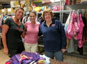 Interfaith volunteers Robin, Judy & Therese have already been hard at work sorting through costume donations.